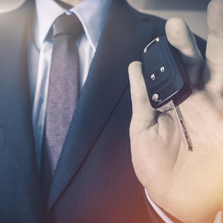 salesman with car keys